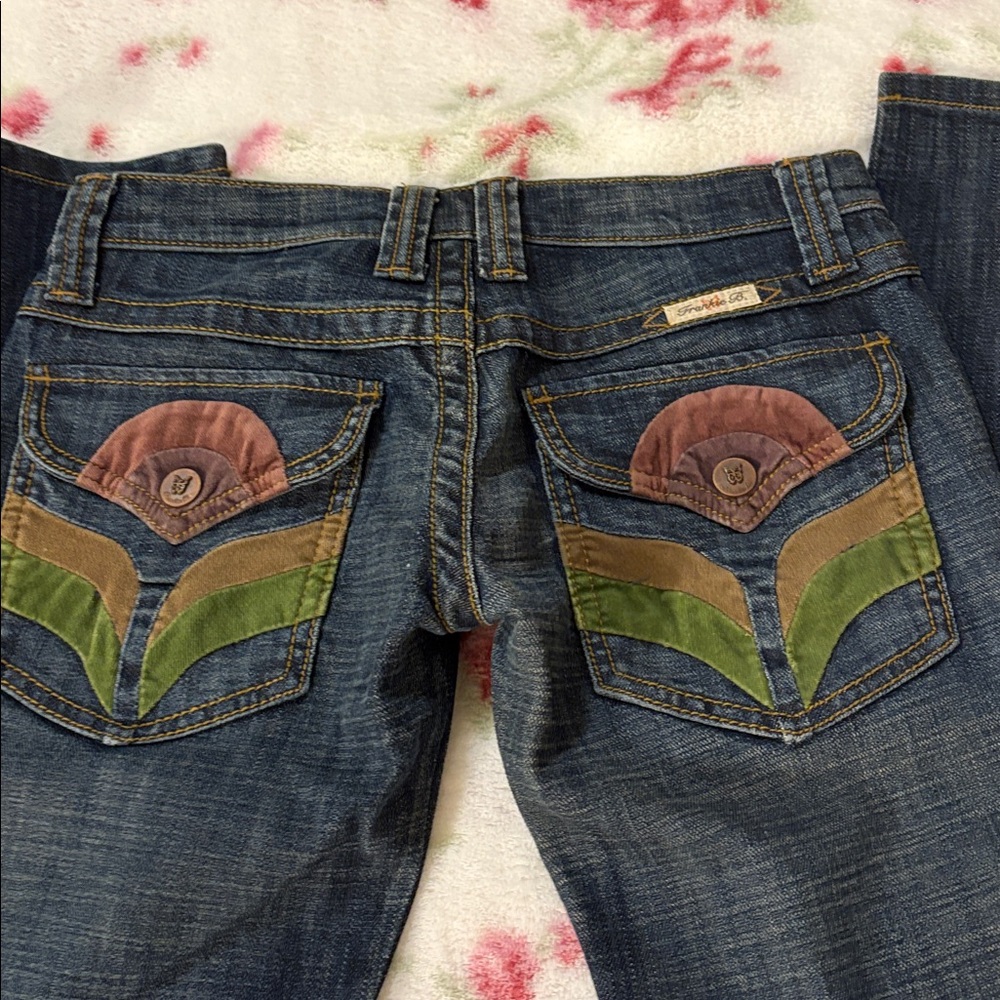 Sold -Frankie b jeans size 2  flare/bootcut- Suede like flower pocket. Rare?